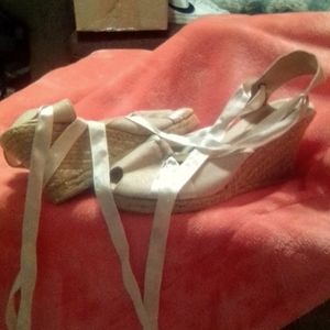 Wedge shoes that tie up around ankle to leg